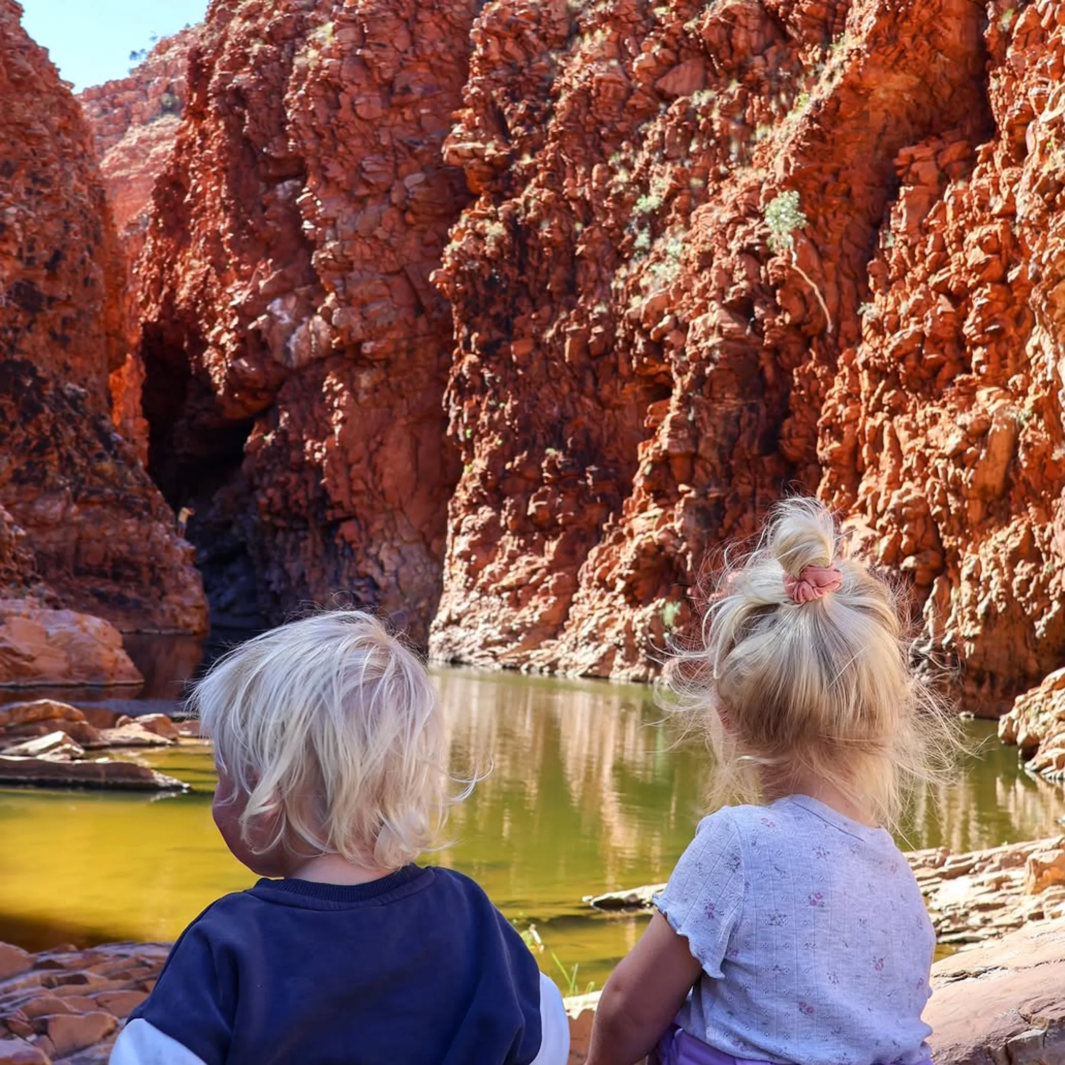 family hiking in nt red-rock gorge