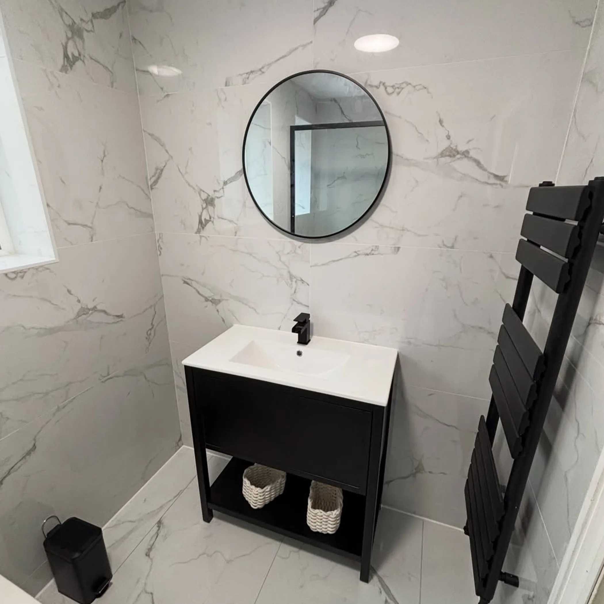 renovated bathroom with plumbing fixtures